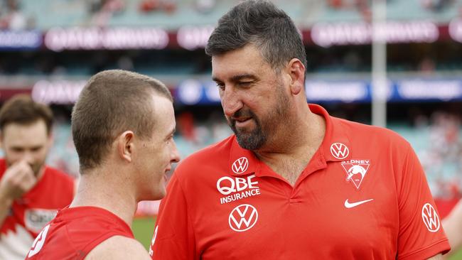 SYDNEY, AUSTRALIA - MAY 04: Chad Warner of the Swans speaks to Dean Cox, coach of the Sydney Swans after the round eight AFL match between Sydney Swans and GWS Giants at Sydney Cricket Ground, on May 04, 2025, in Sydney, Australia. (Photo by Darrian Traynor/AFL Photos/via Getty Images)