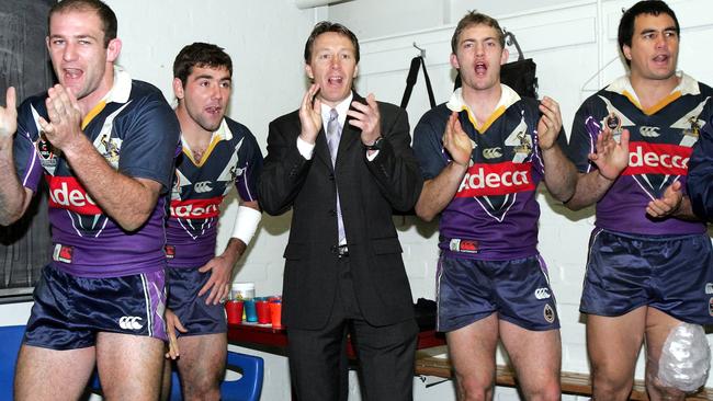 Matt Geyer, Cam Smith (Cameron Smith), Craig Bellamy, Dallas Johnson and Alex Chan break into song after the win. Melbourne Storm v Parramatta. Olympic Park.