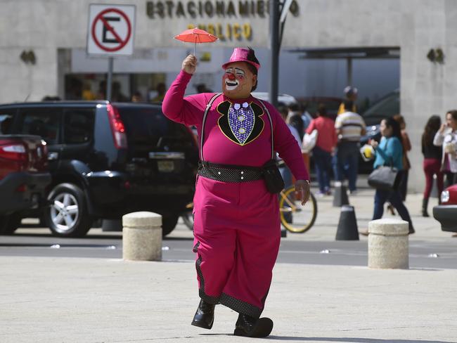 <!DOCTYPE html PUBLIC "-//W3C//DTD HTML 4.0 Transitional//EN" "http://www.w3.org/TR/REC-html40/loose.dtd"><html><body><p>A clown walks during the third day of the XXI Convention of Clowns, at the Jimenez Rueda Theatre, in Mexico City on October 19, 2016. Picture: AFP PHOTO / Alfredo ESTRELLA</p></body></html>