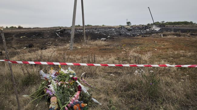 Needs scouring ... the Grabovo main crash site of flight MH17 has been left deserted. Picture: Ella Pellegrini