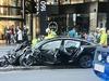Tesla destroyed after crashing into ambulance in Brisbane CBD