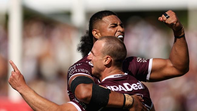 SYDNEY, AUSTRALIA - MARCH 04: Daly Cherry-Evans of the Sea Eagles celebrates scoring a try with Haumole Olakau'atu of the Sea Eagles during the round one NRL match between the Manly Sea Eagles and the Canterbury Bulldogs at 4 Pines Park on March 04, 2023 in Sydney, Australia. (Photo by Cameron Spencer/Getty Images)