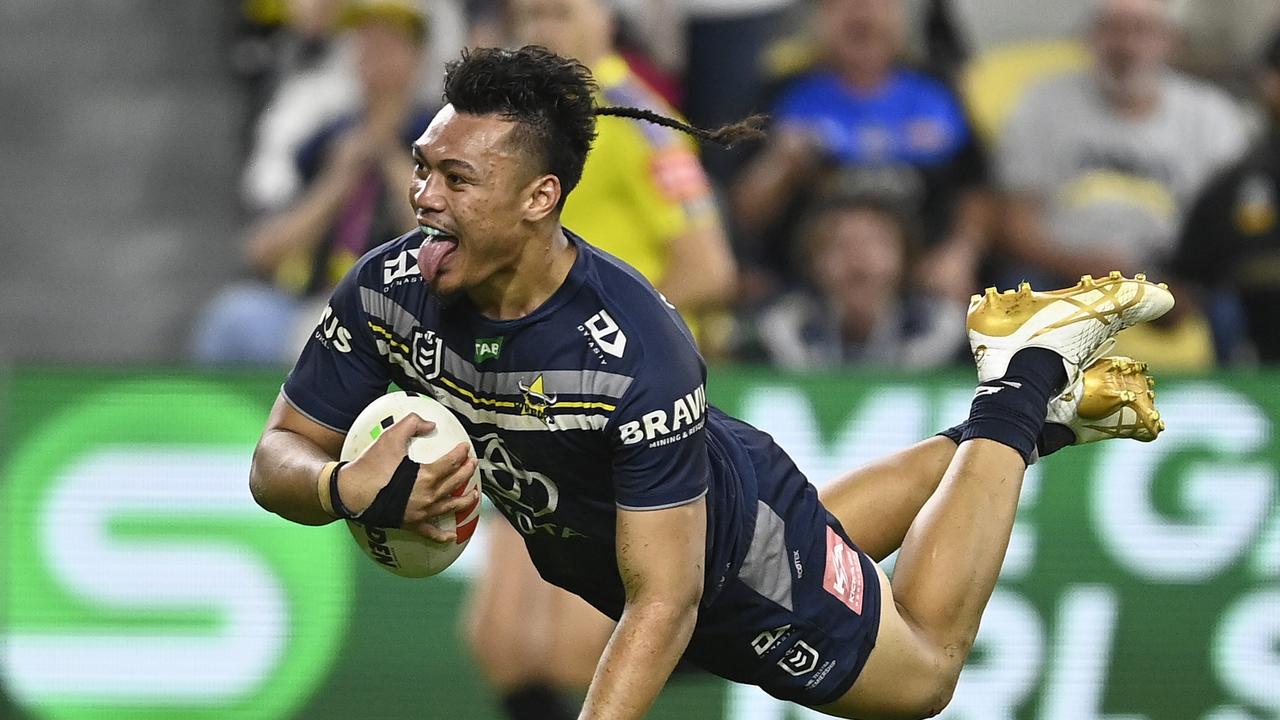 Jeremiah Nanai celebrates one of 13 tries for the Cowboys. (Photo by Ian Hitchcock/Getty Images)