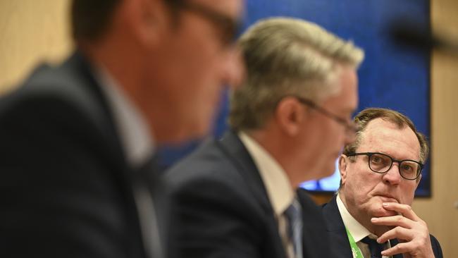 Australian Taxation Office commissioner Chris Jordan reacts during a Senate inquiry at Parliament House in Canberra.