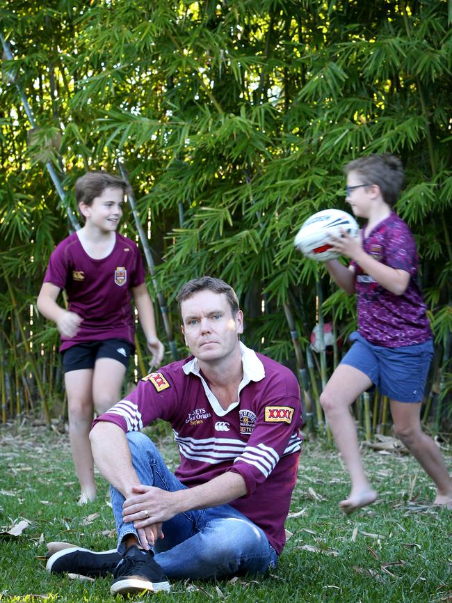 Gerard Fitzsimon with his boys Isaac, 9, (left) and Tom, 11. Picture: AAP/Steve Pohlner