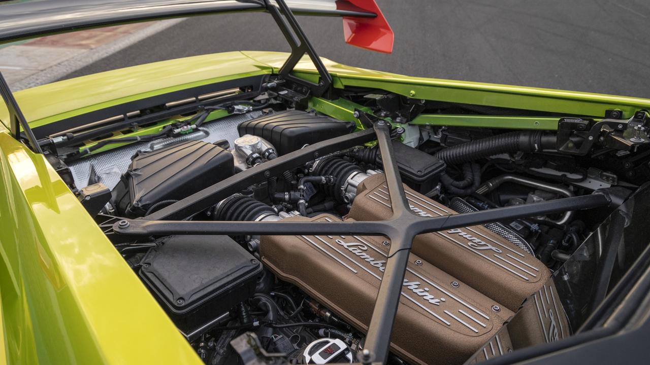 The Huracan’s one-piece bonnet lifts away to reveal an enormous engine.