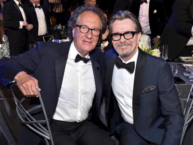 Geoffrey Rush and Gary Oldman appear in the audience at the the 24th Annual Screen Actors Guild Awards at The Shrine Auditorium on January 21, 2018 in Los Angeles, California. Picture: AP