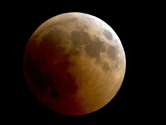 A blood moon rises over Cairo, Egypt. Picture: AP Photo/Amr Nabil