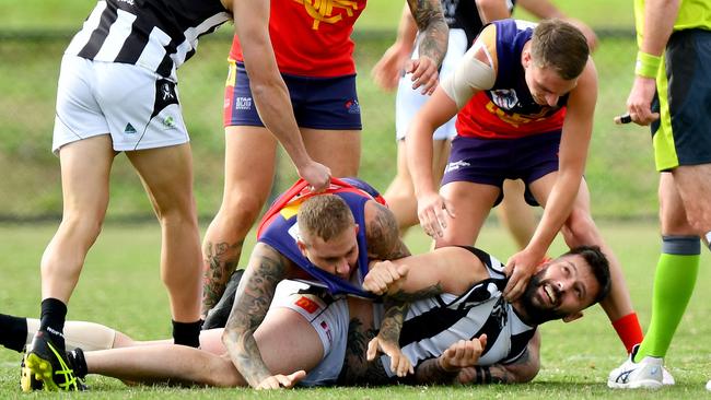 Diggers Rest and Wallan players get to know each other. Picture: Josh Chadwick