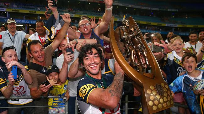 Cowboys captain Johnathan Thurston poses with the Premiership trophy after winning the 2015 NRL grand final match against the Brisbane Broncos. Picture: Cameron Spencer/Getty Images