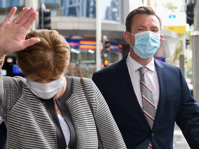 Warby and his mother attempt to avoid the media on Wednesday. Picture: NCA NewsWire/Bianca De Marchi