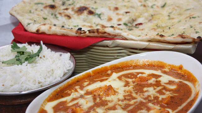 POPULAR: Butter chicken, rice and naan bread from Spicy Bite in Cairns.