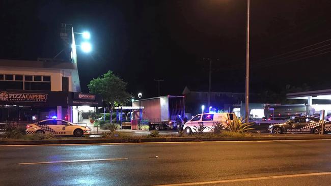 Police pounce on a truck driver accused of driving dangerously on the Gold Coast on Friday night. Picture: Krissy Jarvie