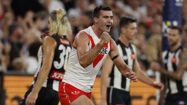 MELBOURNE , AUSTRALIA. March 15 , 2024.  AFLÃ Round 1. Collingwood vs Sydney Swans at the MCG.  Sydneys Logan McDonald celebrates a 3rd quarter goal   . Pic: Michael Klein