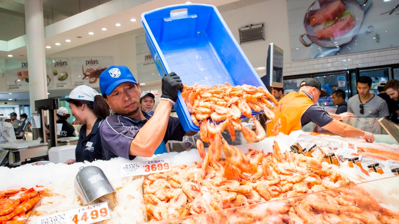 Shoppers crowd Sydney Fish Markets