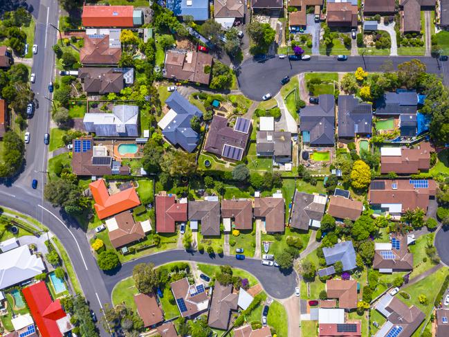 Aerial view of Suburban roof tops directly above