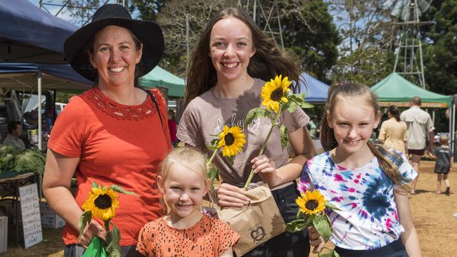 Beverley Blanch picked up some lovely sunflowers with her daughters (from left) Kylie, Susan and Veronica Blanch at the Toowoomba Farmers' Market, Saturday, October 17, 2020. Picture: Kevin Farmer