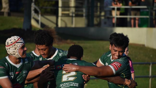 Su’a (second from the left) after scoring a crucial try.