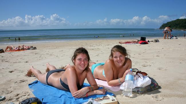 Tourists Francesca Salzano and Georgie Strang relaxing on Noosa Main beach.