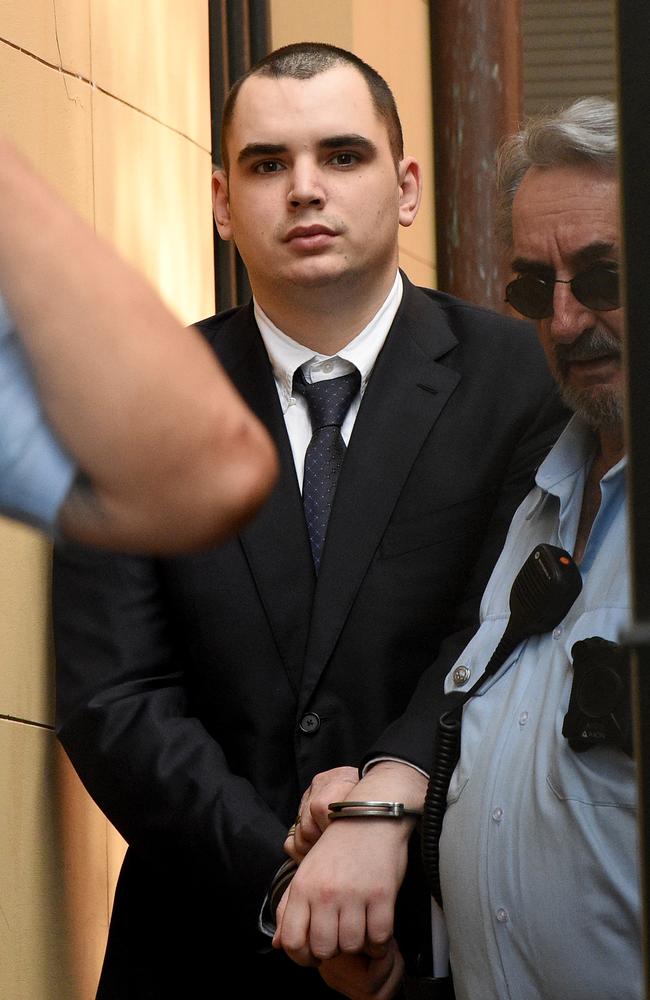 Mathew Flame is lead into a corrections van at the Supreme Court in Sydney on Wednesday. Picture: NCA NewsWire/Bianca De Marchi