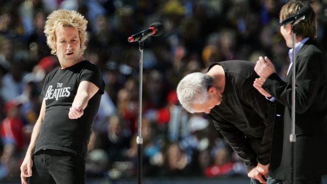 Brian Mannix performing at the 2006 AFL Grand Final.