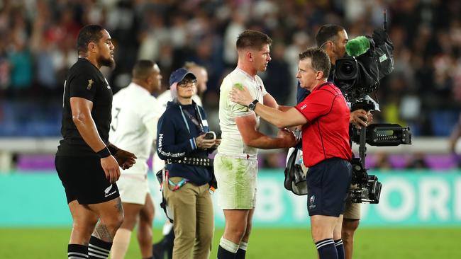 Owen Farrell of England shakes hands with referee Nigel Owens after the semi-final. Picture: Getty Images