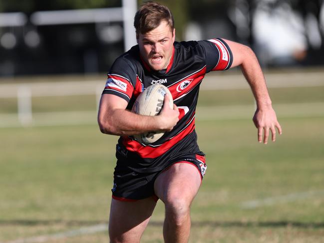 Sam McCann taking a run for Collegians. Picture: Steve Montgomery