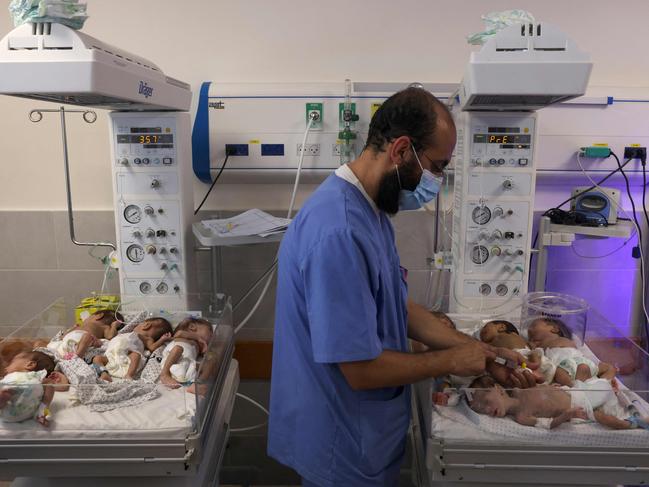 A Palestinian medic cares for premature babies evacuated from Al Shifa hospital to the Emirates hospital in Rafah in the southern Gaza Strip. Picture: AFP