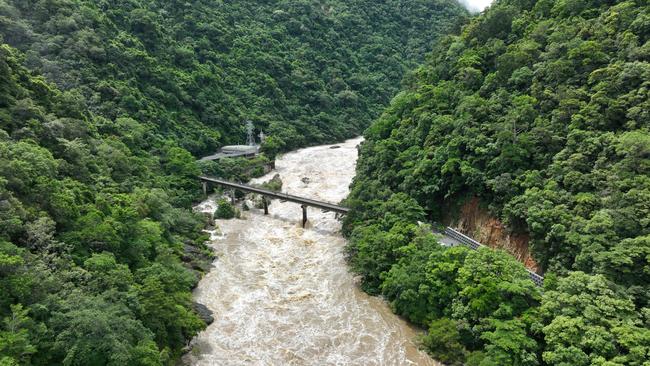 Emergency service crews have responded to reports of a person stuck on a rock while swimming at Barron Falls on Thursday afternoon. Aerial drone picture: Brendan Radke