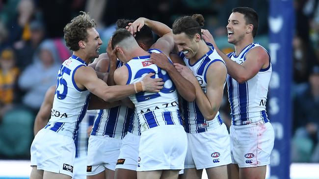 North Melbourne tastes victory.