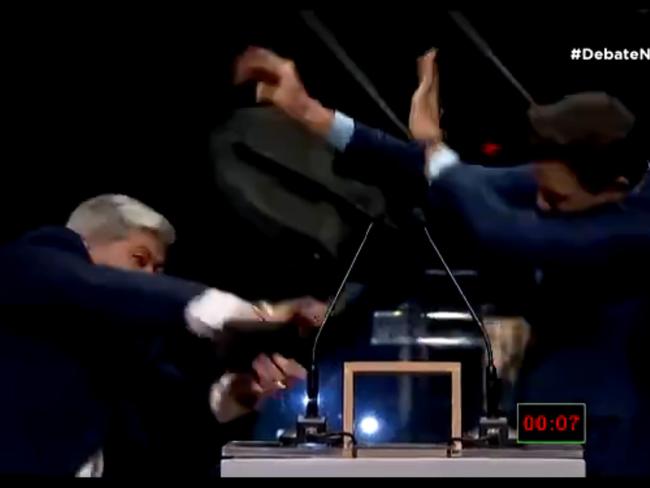 A candidate for mayor of Sao Paulo has physically attacked his challenger with a chair during a televised debate.