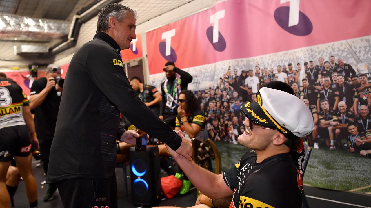 Ivan Cleary shakes hands with his son Nathan after their Grand Final win. Picture: NRL Photos/Gregg Porteous.