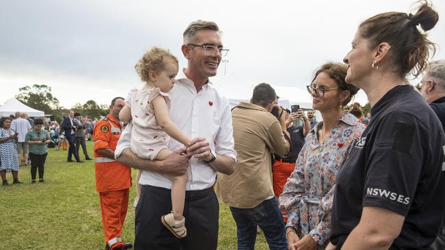 Premier Dominic Perrottet and Emergency Services Minster Steph Cook chat with Karina Tait from the Lismore City SES and her daughter Adelaide Tait. Picture: NCA NewsWire / Natalie Grono