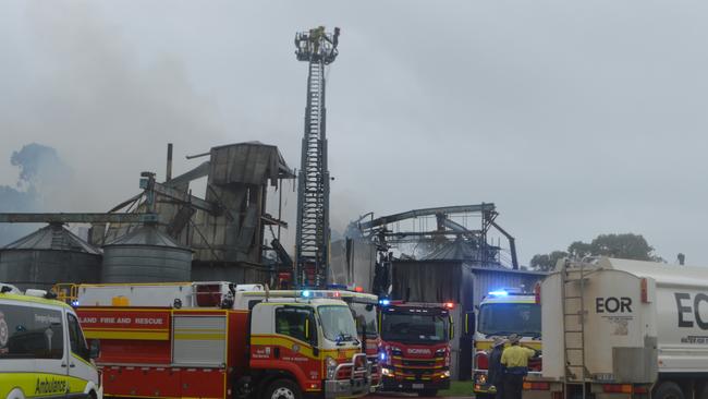 Eight crews from around the Darling Downs work to contain the blaze at Allora Grain and Milling.