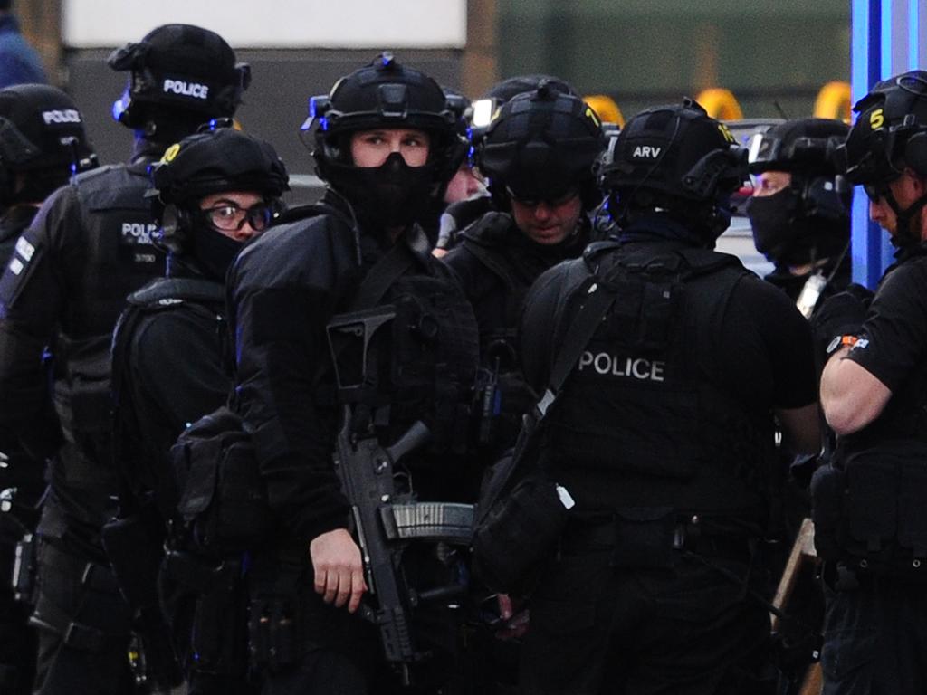 Police gather for a briefing at The Monument in London. Picture: DANIEL SORABJI / AFP.