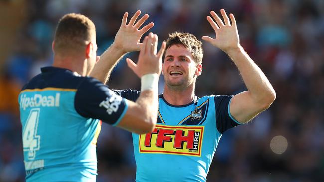 Brenko Lee celebrates a try with Titans teammate Anthony Don. Picture: Getty Images