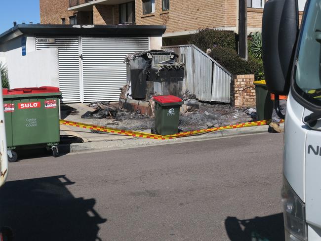 The fire buckled an adjourning fence and badly charred a nearby power pole. Picture: Richard Noone