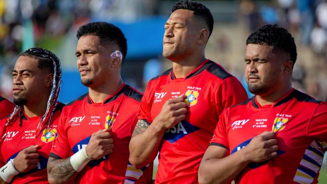 Folau, second right, with his Tongan teammates before the World Rugby Pacific Nations Cup match against Fiji in July. Picture: AFP<span class="h3"/>