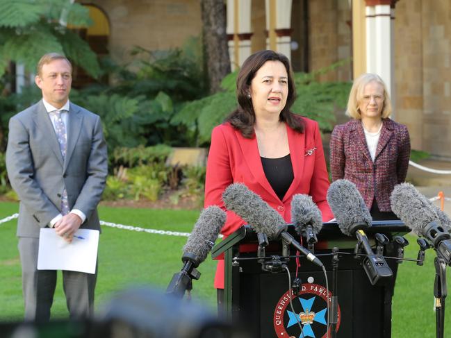 Premier Annastacia Palaszczuk flanked by Health Minister Steven Miles and Chief Health Officer Jeannette Young. Picture: Mark Cranitch