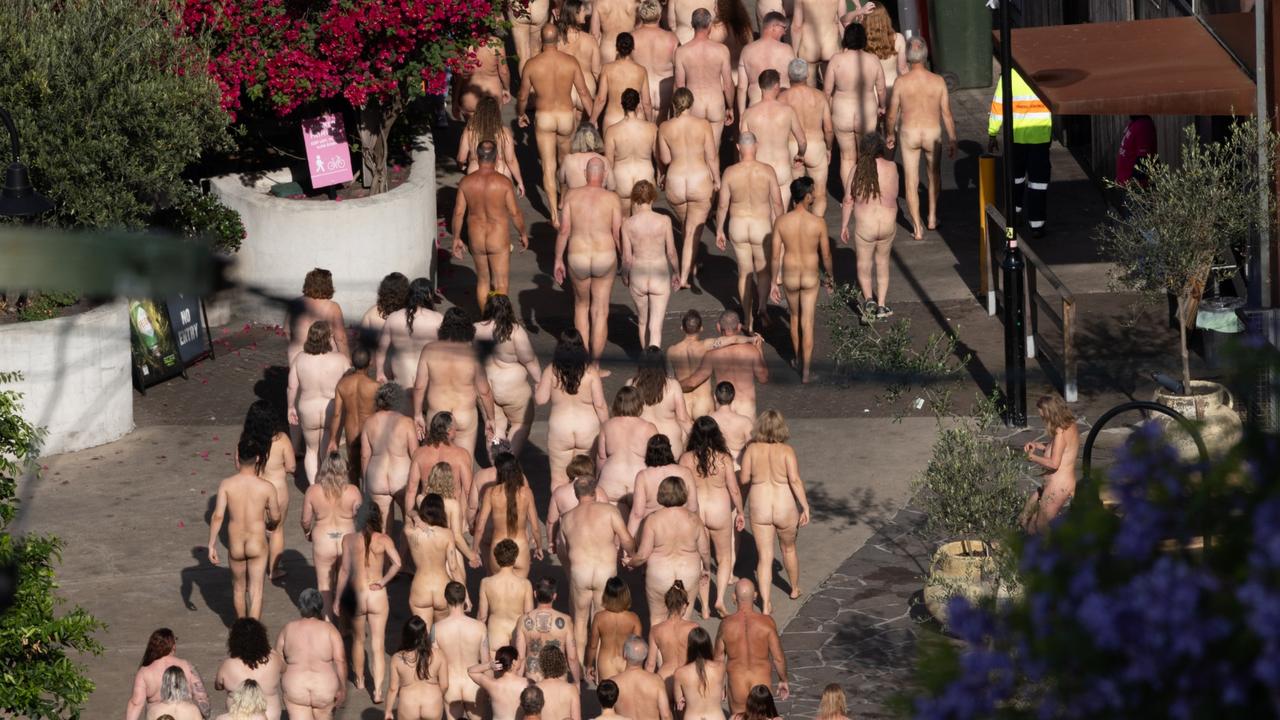 Shock as huge nude crowd takes over bridge