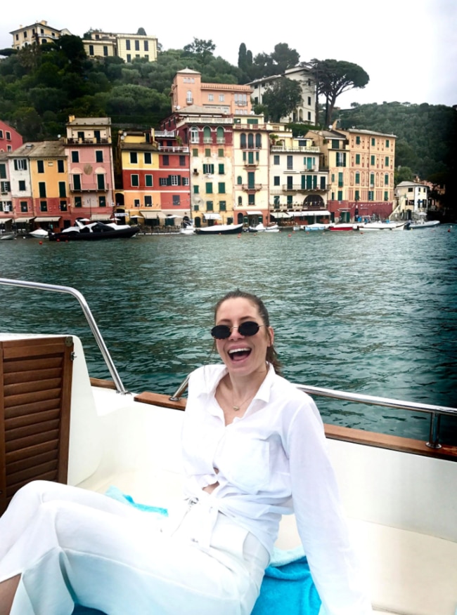 Millennial traveller Carly Williams in Portofino, Italy.