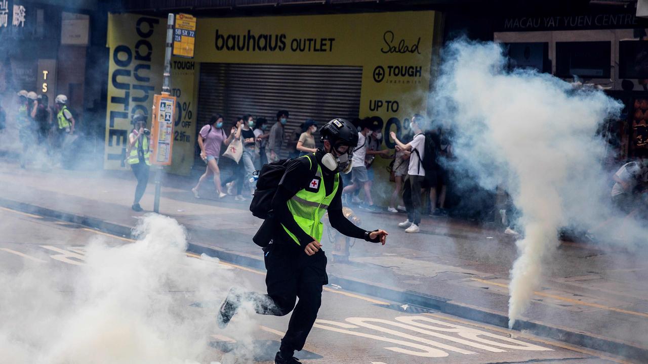 Police fire tear gas on protesters during a planned protests against a proposal to enact a new security legislation in Hong Kong. Picture: Isaac Lawrence / AFP