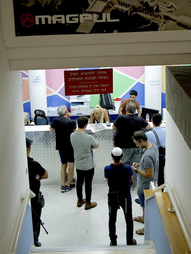 People lining up at the National Olympic Shooting Centre in Herzliya.