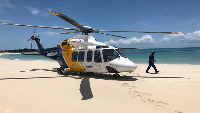 The CareFlight helicopter and crew during their epic rescue from Rimbija Island