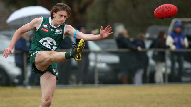 Tom Brindley gets a kick for Greensborough. Picture: Hamish Blair