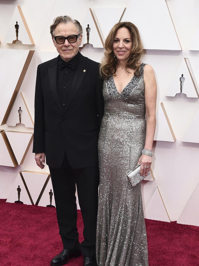 Actor Harvey Keitel, left, and Daphna Kastner walk the red carpet. Picture: AP