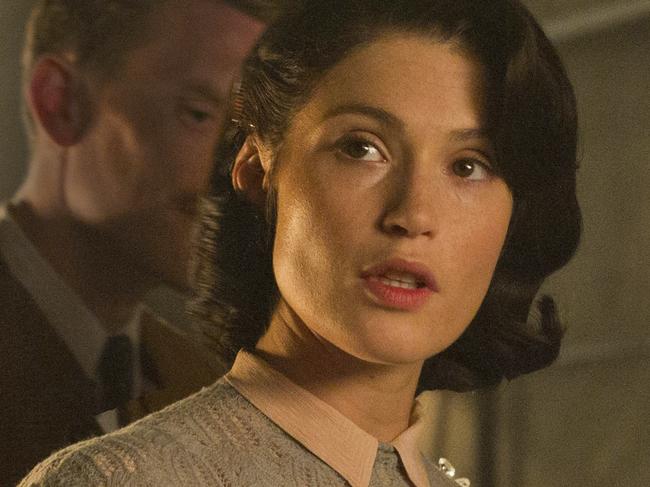 In this image released by STX Entertainment, Gemma Arterton, left, and Billy Nighy appear in a scene from, "Their Finest". (Nicola Dove/STX Entertainment via AP)