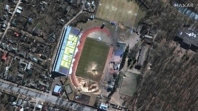 Large craters and a damaged Olympic sports training centre in Chernihiv, Ukraine. Picture: Maxar Technologies/AFP