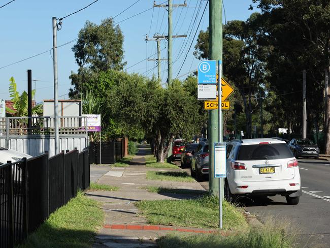 The bus stop outside Crawford Public School in Doonside on Saturday morning, after forensic police finished their work. Picture: Tim Hunter.