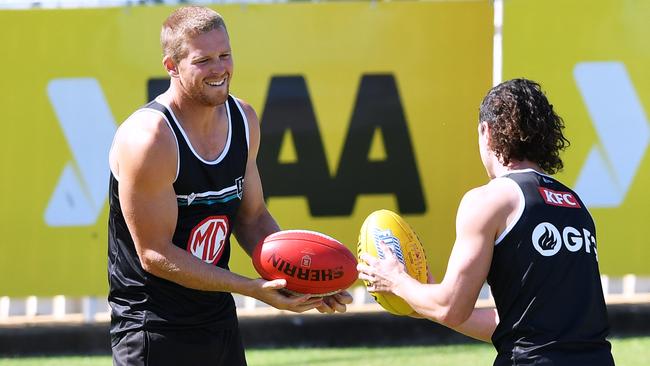 Tom Clurey and Darcy Byrne-Jones train at a Port Adelaide session in 2021. Picture Mark Brake